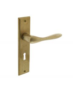 Intersteel Deurkruk Banaan met schild 181x41x7mm sleutelgat 56mm messing getrommeld